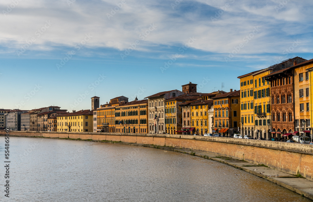 colorful houses on the waterfront of the Arno River in downtown Pisa