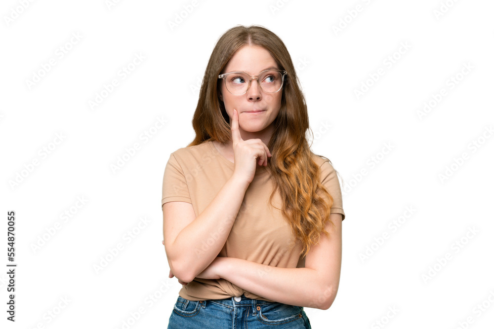 Young pretty woman over isolated background having doubts and thinking Young pretty woman over isolated background having doubts and thinking