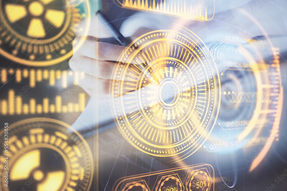 Fototapeta premium Tech theme hologram over woman's hands taking notes background. Concept of hightech. Double exposure