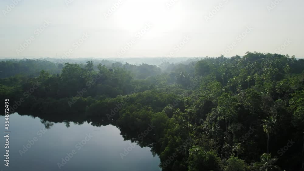 Aerial view of a local fisherman fishing in a traditional boat Aerial view of a local fisherman fishing in a traditional boat