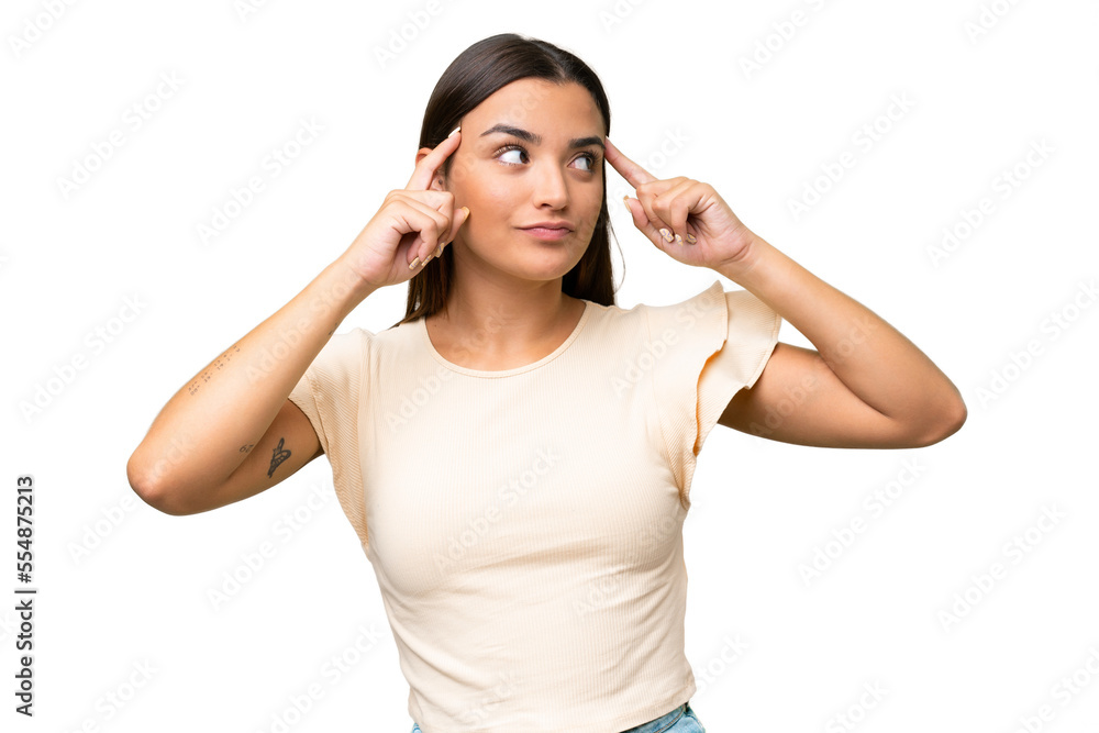 Young caucasian woman isolated on green chroma background having doubts and thinking Young caucasian woman isolated on green chroma background having doubts and thinking