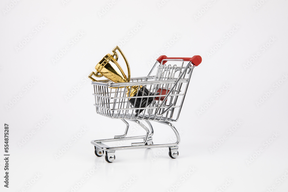 Shopping cart with a trophy inside Shopping cart with a trophy inside