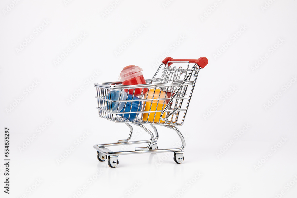 Shopping cart with paint containers inside