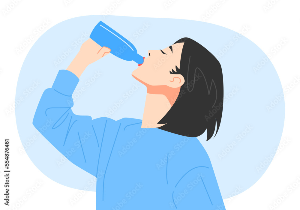 young woman with short hair is drinking mineral water from a bottle. side view, half body. isolated blue background. concept of health, drink, fit, etc. fla young woman with short hair is drinking mineral water from a bottle. side view, half body. isolated blue background. concept of health, drink, fit, etc. fla
