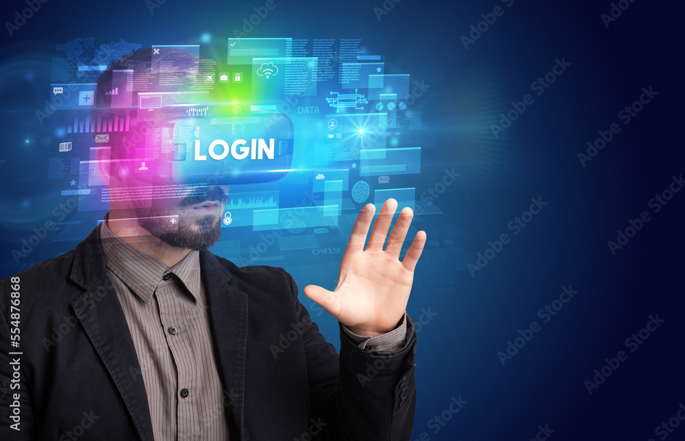 Businessman looking through Virtual Reality glasses Businessman looking through Virtual Reality glasses