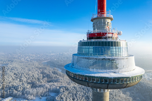 Aerial winter snowy day view of frozen Vilnius TV Tower, Lithuania