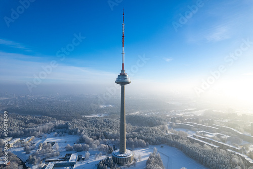 Aerial winter snowy day view of frozen Vilnius TV Tower  Lithuania