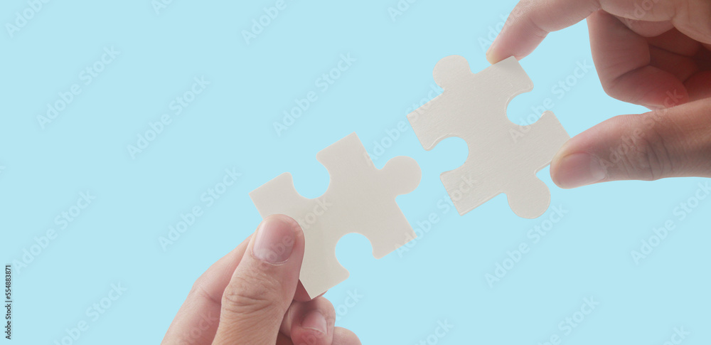Connecting jigsaw puzzle. Business solutions success Connecting jigsaw puzzle. Business solutions success