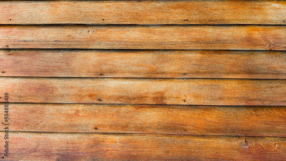 Texture of traditional overlapped brown wooden wall background Texture of traditional overlapped brown wooden wall background