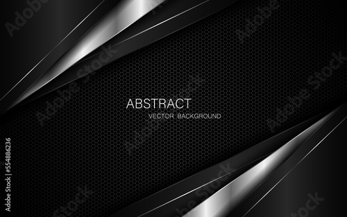 Abstract black and silver polygons on dark steel mesh background. with free space for design. modern technology innovation concept background
