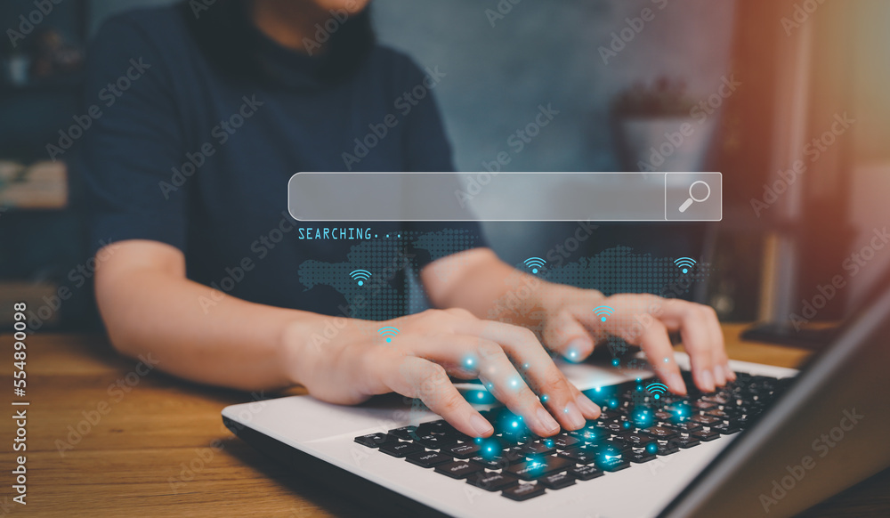 Searching Browsing Internet Data Information with blank search bar.SearchEngine Optimization SEO Networking Concept.handof businessman working with computer laptop on desk in office. Searching Browsing Internet Data Information with blank search bar.SearchEngine Optimization SEO Networking Concept.handof businessman working with computer laptop on desk in office.