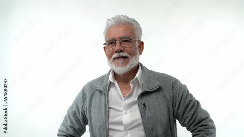 The retired man smirks and reflects on the philosophy of living alone. The retired man smirks and reflects on the philosophy of living alone.