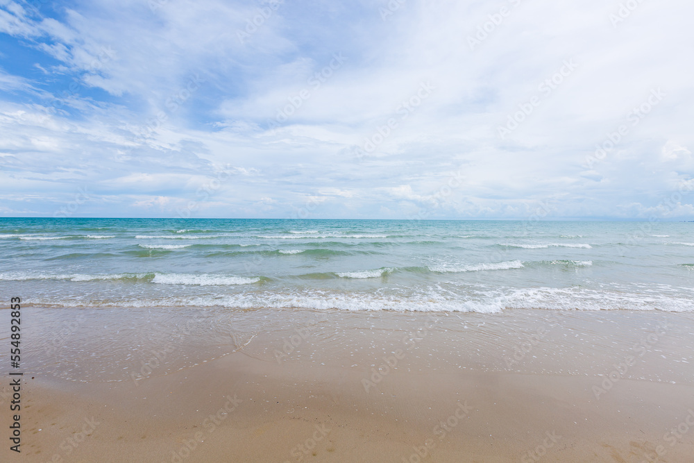 Natural scenery of a beautiful tropical beach. The sky is clear with little sunlight.