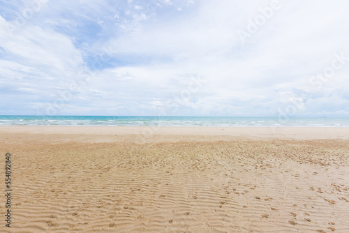 Natural scenery of a beautiful tropical beach. The sky is clear with little sunlight.
