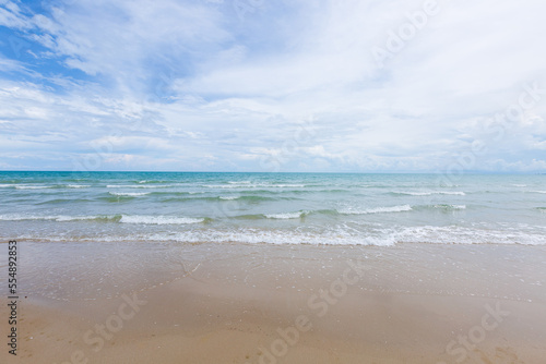 Natural scenery of a beautiful tropical beach. The sky is clear with little sunlight.