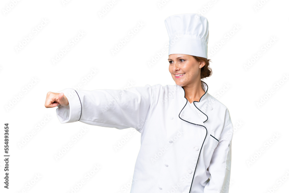 Middle-aged chef woman over isolated background giving a thumbs up gesture Middle-aged chef woman over isolated background giving a thumbs up gesture