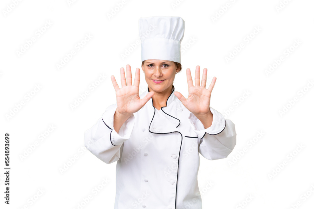 Middle-aged chef woman over isolated background counting ten with fingers Middle-aged chef woman over isolated background counting ten with fingers