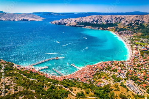 Town and bay of Baska aerial panoramic view on Krk island