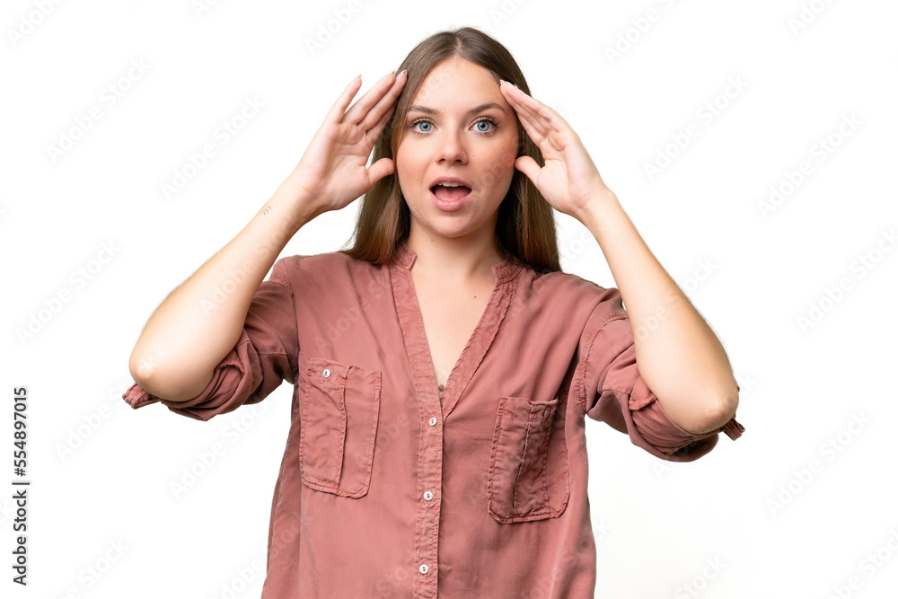 Young beautiful blonde woman over isolated background with surprise expression Young beautiful blonde woman over isolated background with surprise expression