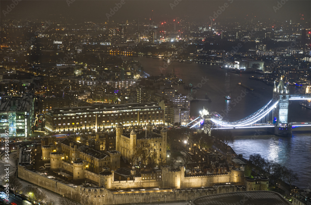Tower of London at night including Tower Bridge in Great Britain Europe aerial view