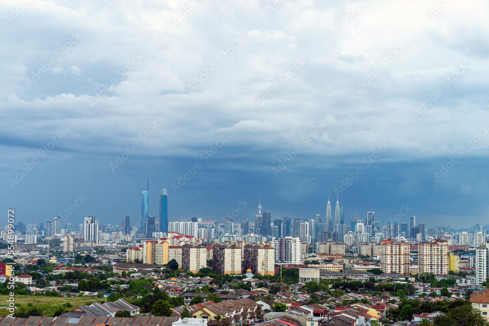 View of cumulus clouds over down town Kuala Lumpur, Malaysia.