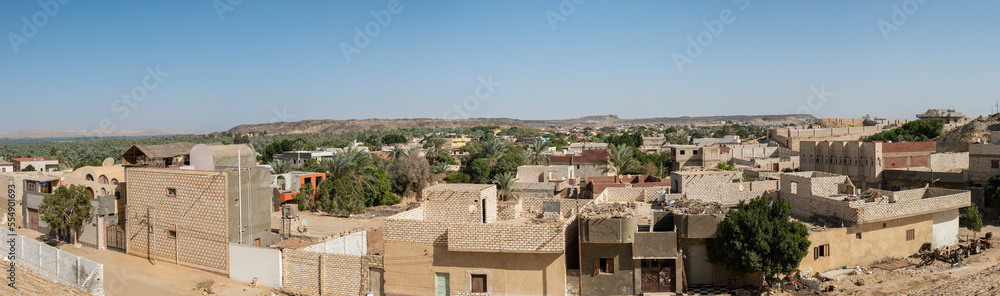 Panoramic view over remote african town with oasis