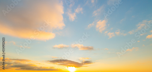clouds and orange sky,Real amazing panoramic sunrise or sunset sky with gentle colorful clouds. Long panorama, 