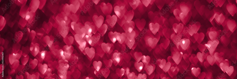 Trendy viva magenta, pink red hearts, sparkling glitter bokeh panoramic background banner, valentines day abstract defocused texture header. Color of the year 2023 Trendy viva magenta, pink red hearts, sparkling glitter bokeh panoramic background banner, valentines day abstract defocused texture header. Color of the year 2023
