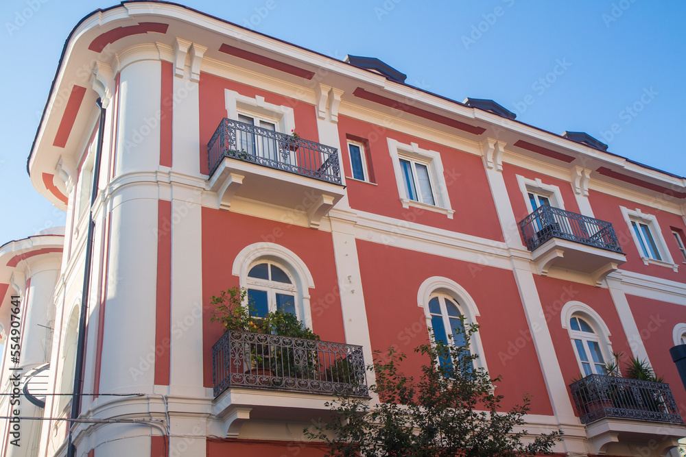 Naklejka premium characteristic and ancient facade of a building in Aversa