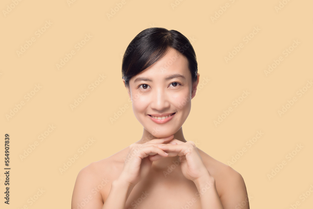 Portrait healthy pretty young woman isolated on white background. beautiful female model person applying cosmetic cream for skincare on fresh makeup clean face. spa, treatment, wellness concept. Portrait healthy pretty young woman isolated on white background. beautiful female model person applying cosmetic cream for skincare on fresh makeup clean face. spa, treatment, wellness concept.