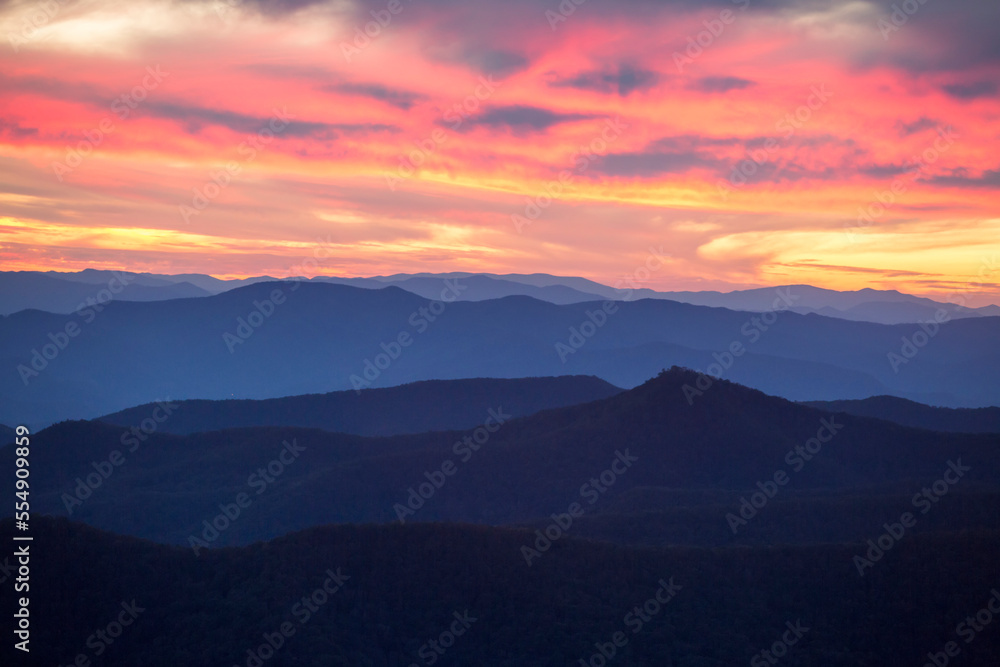 Blue Ridge Mountain ridgelines are visible at sunset; North Carolina, United States of America Blue Ridge Mountain ridgelines are visible at sunset; North Carolina, United States of America