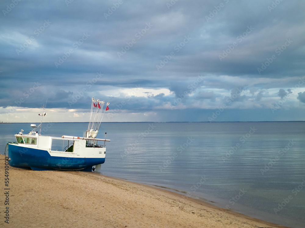 Fishing boat on a Baltic Sea coast in Mechelinki, Poland. Fishing boat on a Baltic Sea coast in Mechelinki, Poland.