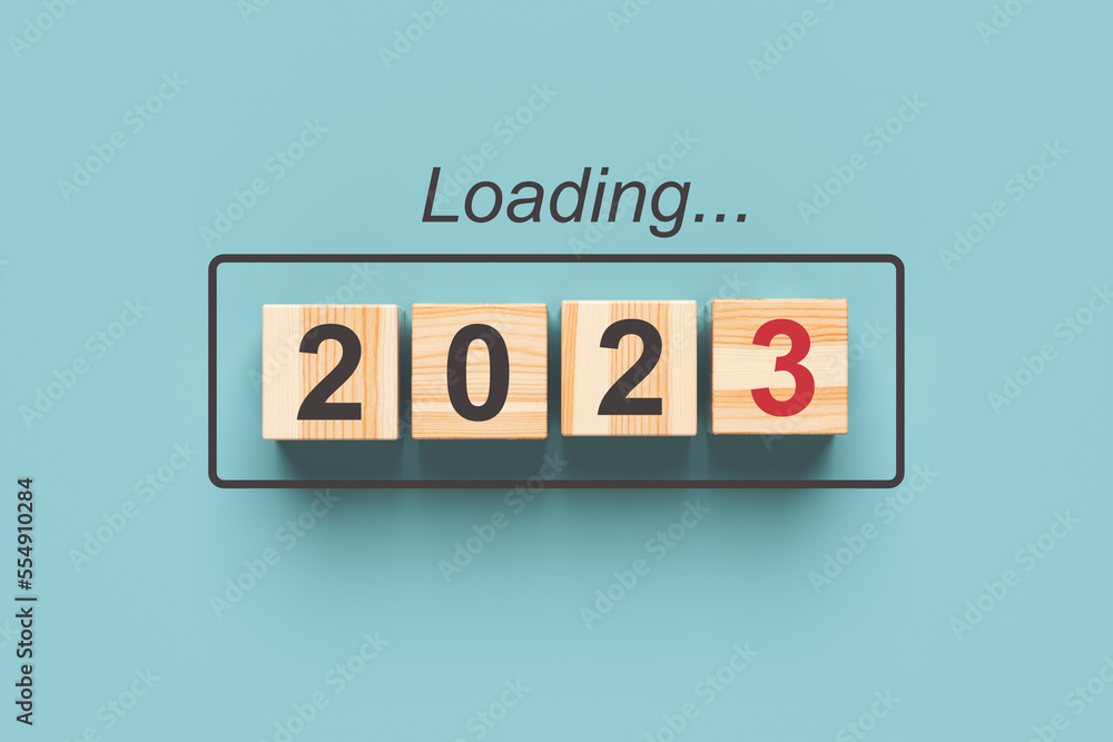 2023 new year loading. Wooden cubes with 2023 on a blue background. 3d ...
