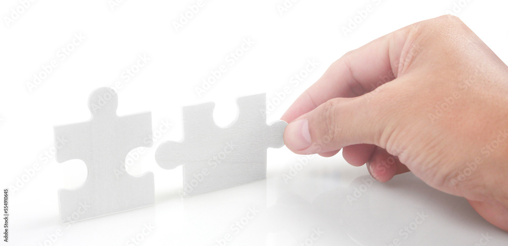 Connecting jigsaw puzzle. Business solutions success Connecting jigsaw puzzle. Business solutions success