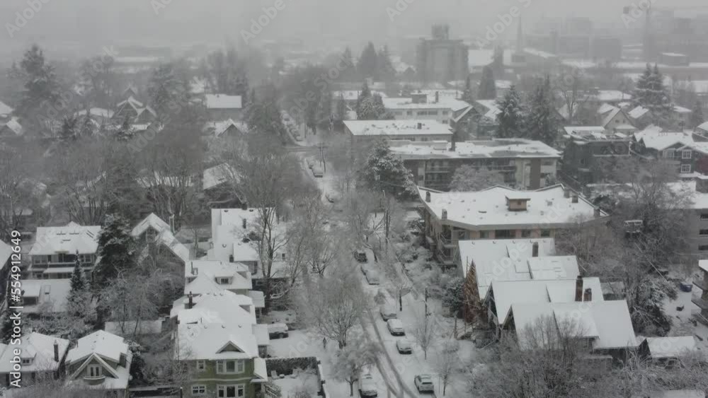 Aerial shot of roofs and roads covered with the snow on a snowy day in Vancouver Aerial shot of roofs and roads covered with the snow on a snowy day in Vancouver