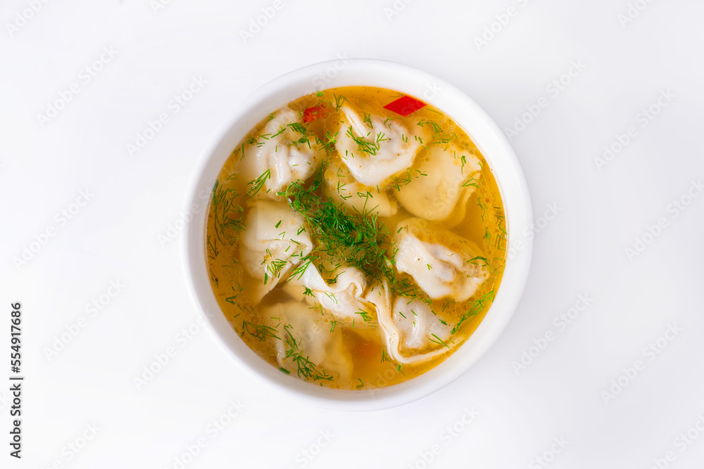 dumplings with broth on a white background dumplings with broth on a white background