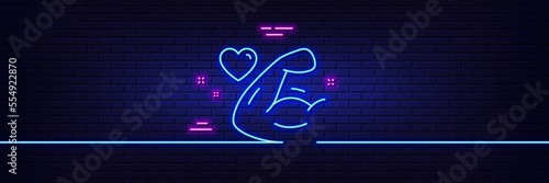 Neon light glow effect. Strong arm line icon. Strength muscle sign. Gym fit training symbol. 3d line neon glow icon. Brick wall banner. Strong arm outline. Vector