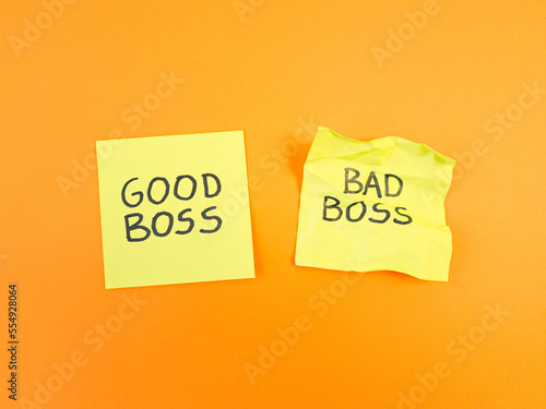 Good or bad boss handwritten on sticky notes. Leadership, management skills, business concept