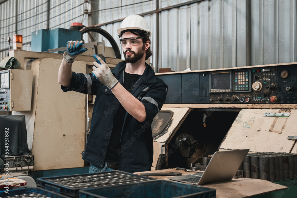 Industrial engineers inspect and perform maintenance on the machines at factory machines. Industrial engineers inspect and perform maintenance on the machines at factory machines.