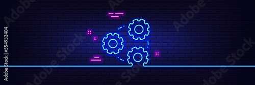 Neon light glow effect. Gears line icon. Teamwork cogwheel sign. Working process symbol. 3d line neon glow icon. Brick wall banner. Gears outline. Vector
