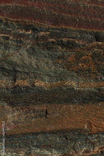 The texture of stone in a mining quarry. The natural appearance of stone extracted from the ground