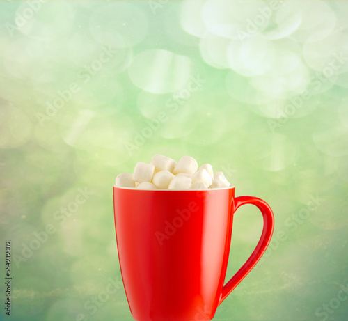 Red cup of cocoa with marshmallow, on Christmas background. Banner for Xmas, traditional christmas and new year concept. copy space for text