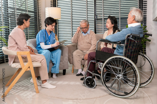 Group of Asian senior people are given advice by professional self care psychologist  at elderly healthcare center, elder group therapy Geriatric consultation concept