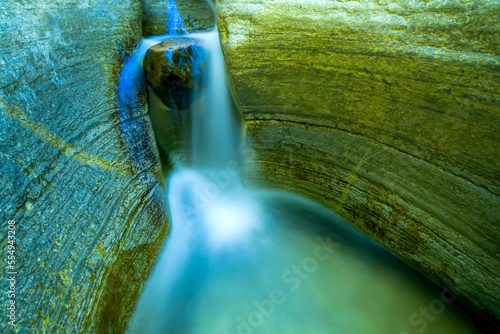 Waterfall and sculpted rocks, Matkatamiba Canyon, Grand Canyon. photo