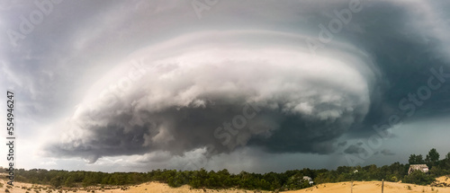Oval shaped gust front cloud moves across the Outer Banks.; Nags Head, North Carolina, USA