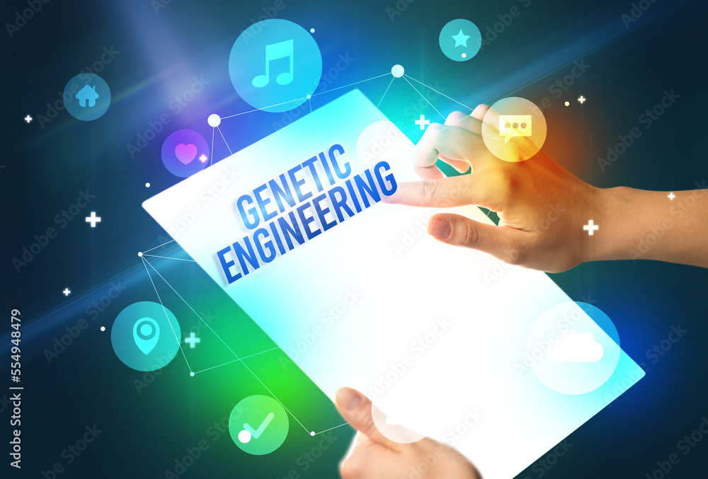 Holding futuristic tablet, new media concept Holding futuristic tablet, new media concept
