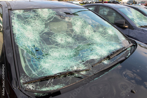 Parked cars with severe hail damage; Blair, Nebraska, United States of America photo