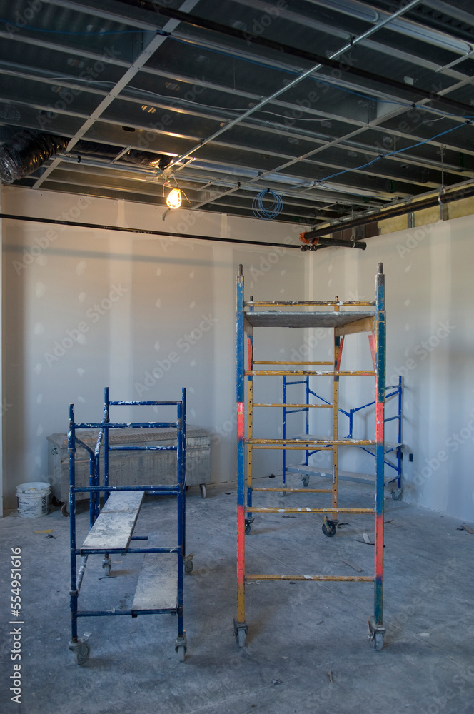Unfinished commercial room, including wiring and freshly installed drywall; Lincoln, Nebraska, United States of America Unfinished commercial room, including wiring and freshly installed drywall; Lincoln, Nebraska, United States of America