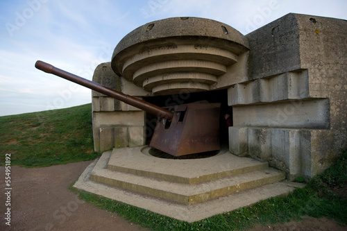 Nazi gun emplacement along the beach at Longues Sur Mer.; Longues sur Mer,  Normandy, France photo