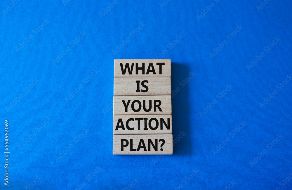 What is your action plan symbol. Wooden blocks with words What is your action plan. Beautiful blue background. Business and What is your action plan concept. Copy space